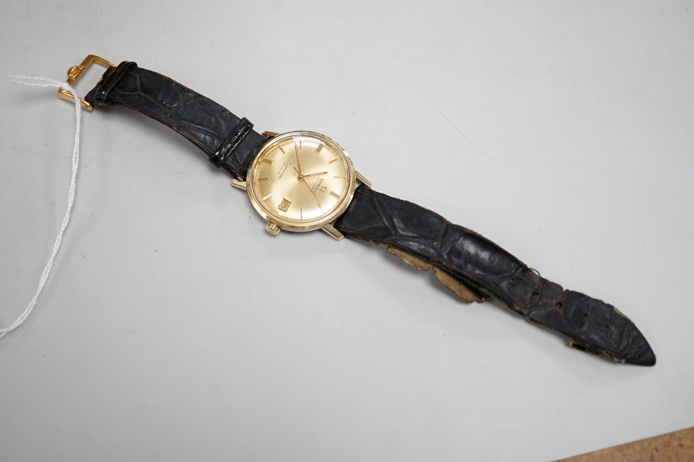 A gentleman's late 1970's steel and gold plated Omega Seamaster De Ville automatic wrist watch, with guarantee booklet, no box.